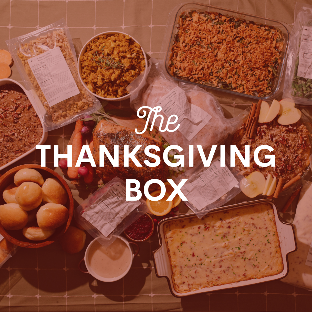 Image with Thanksgiving food with the text "The Thanksgiving Box" on top of the image.
