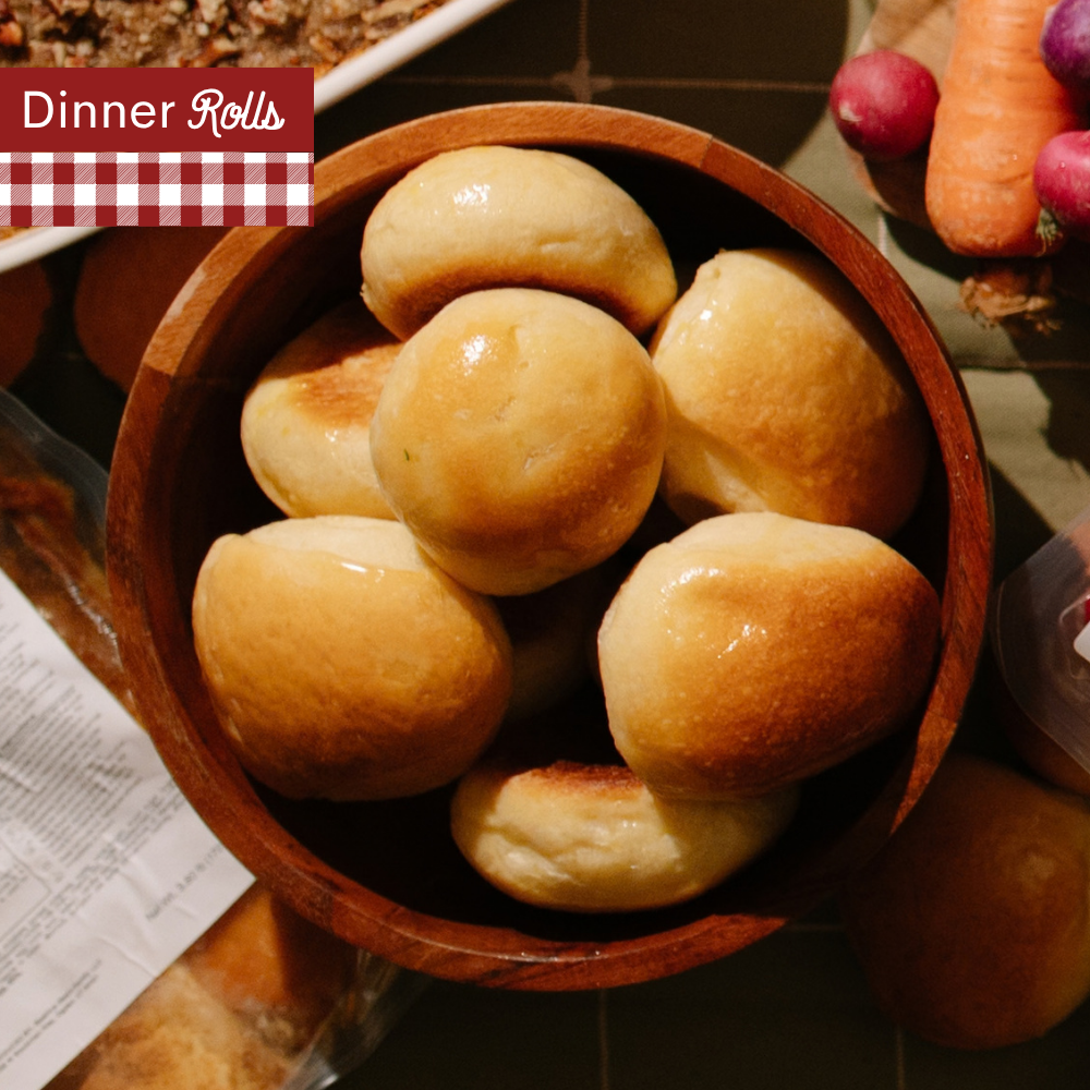 Dinner Rolls in a wooden bowl with A red-and-white gingham banner at the top left reads 'Dinner rolls'.
